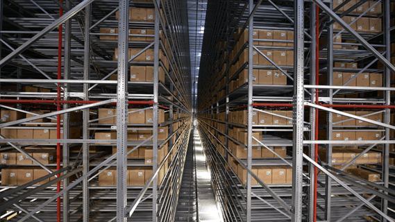 The enormous automatic push/pull carton warehouse on two levels.